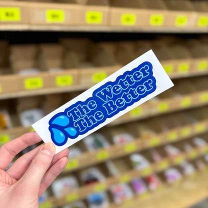 The wetter the better funny vinyl sticker with blue text and water drop graphic