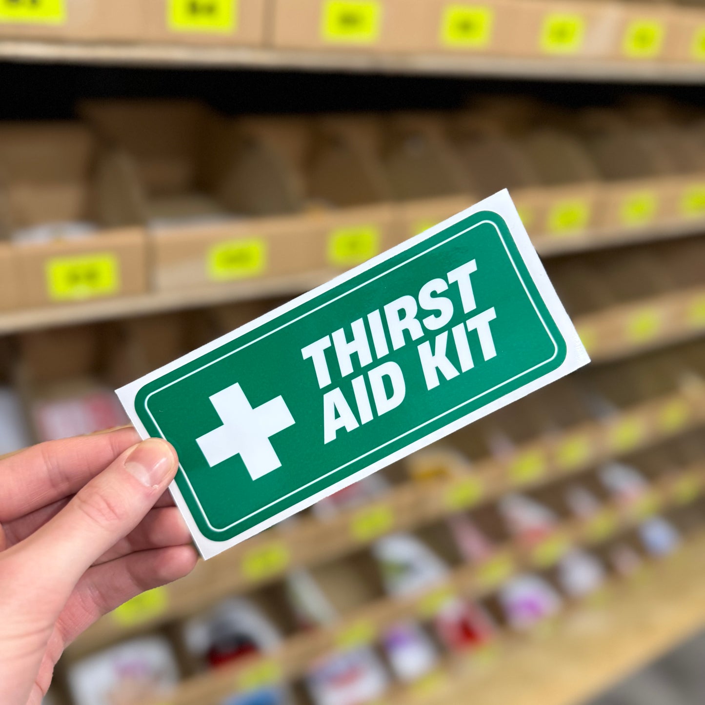 Thirst aid kit funny vinyl sticker in green first aid sign style design