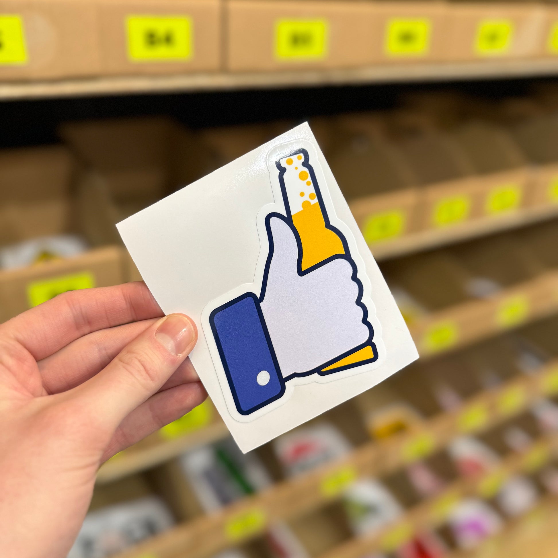 Thumbs up beer funny vinyl sticker with hand holding bottle illustration