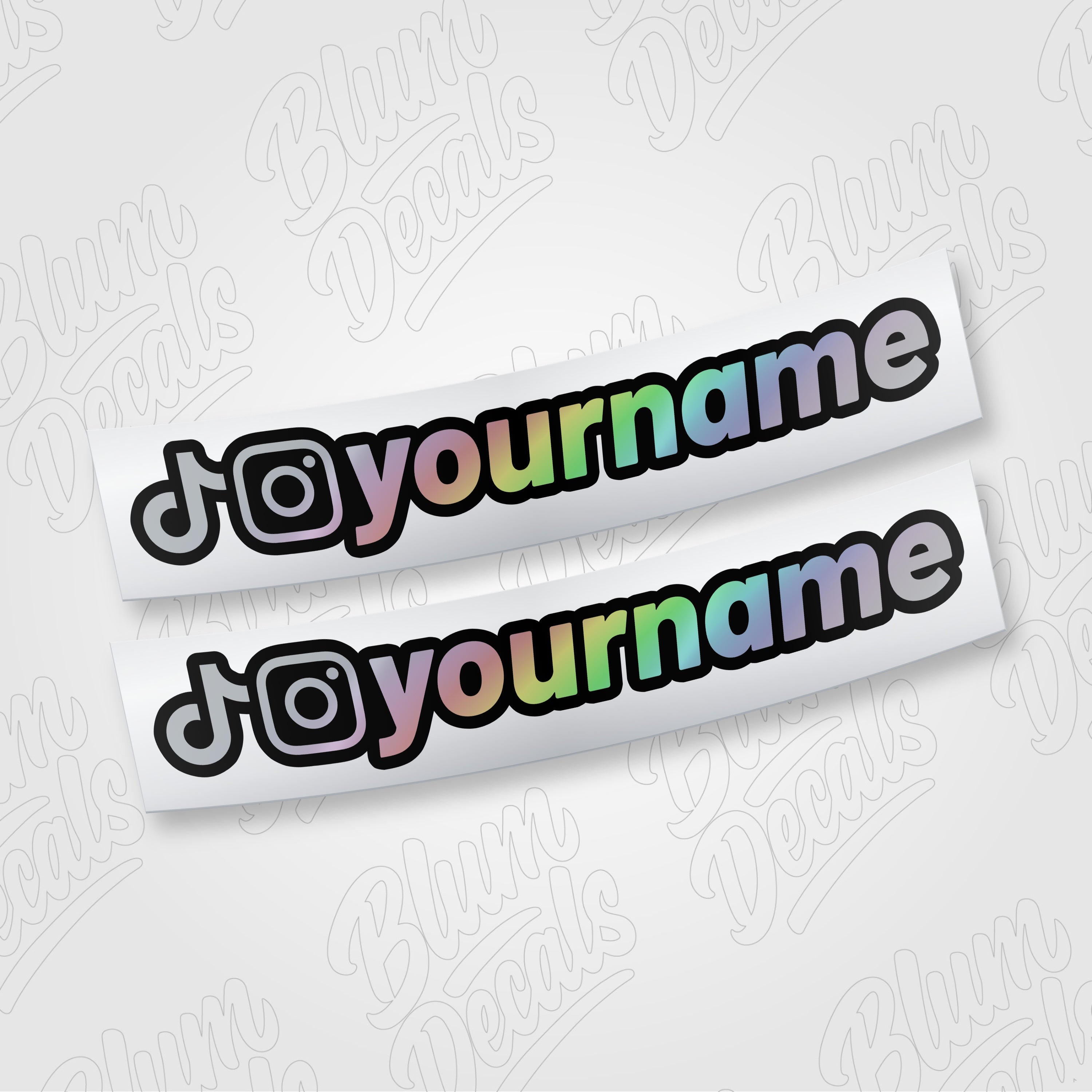 Custom TikTok and Instagram username vinyl decal in silver holographic with a black outline, shown in font 19