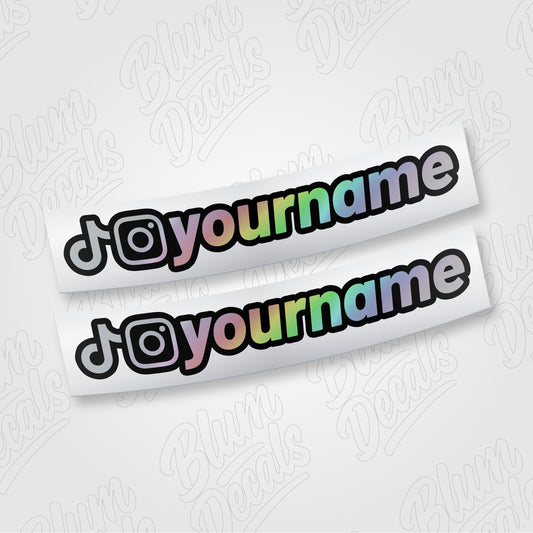 Custom TikTok and Instagram username vinyl decal in silver holographic with a black outline, shown in font 19