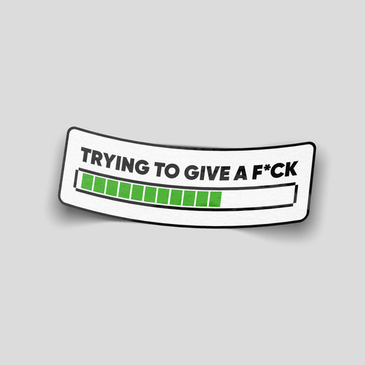 White funny car sticker with black text “Trying to give a f*ck” above a green progress bar graphic, UK novelty decal.