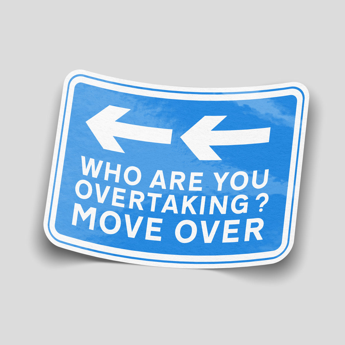 Blue road-sign-style car sticker with two white left-pointing arrows and “Who Are You Overtaking? Move Over” lettering.