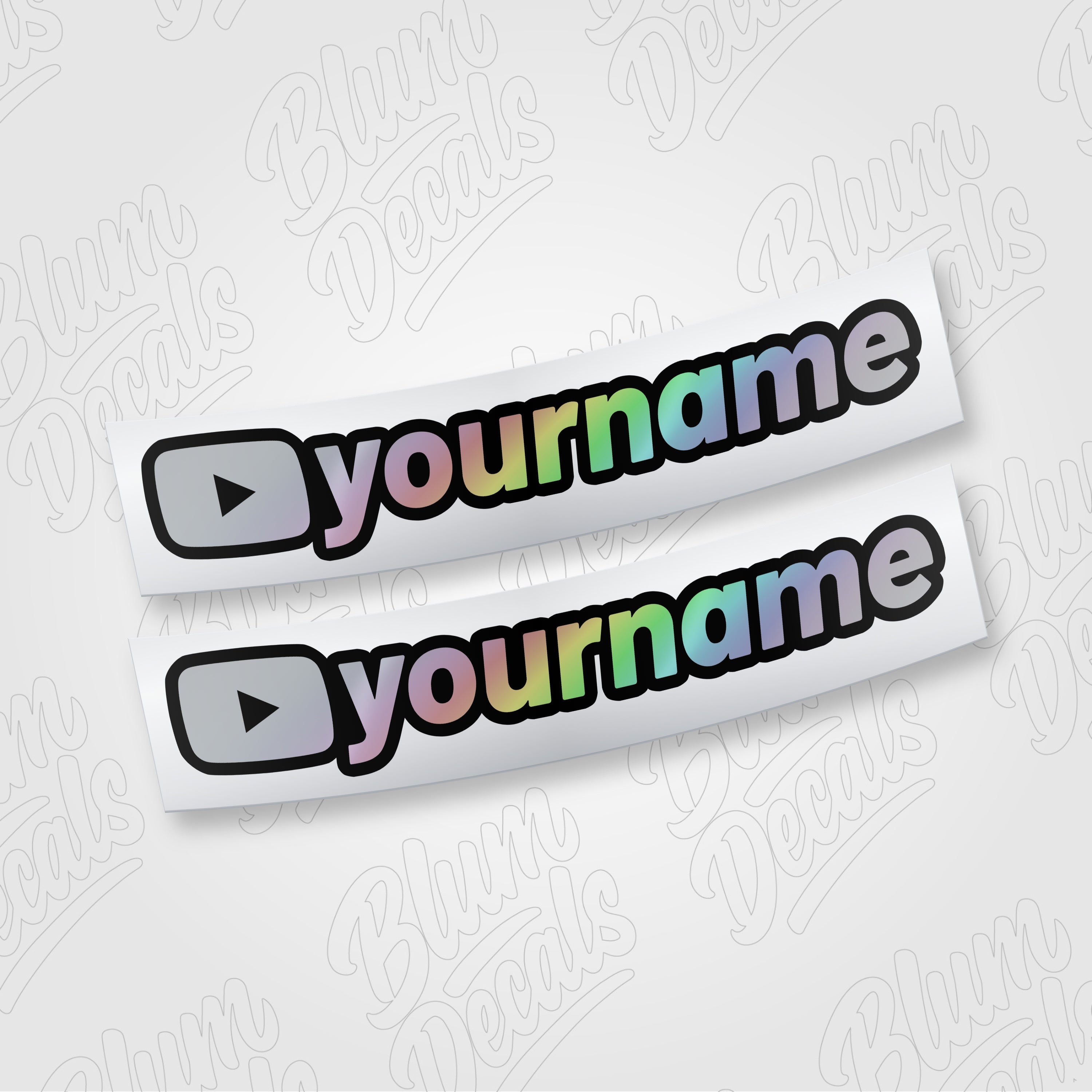 Custom YouTube channel name vinyl decal in silver holographic with a black outline, shown in font 19
