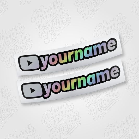 Custom YouTube channel name vinyl decal in silver holographic with a black outline, shown in font 19