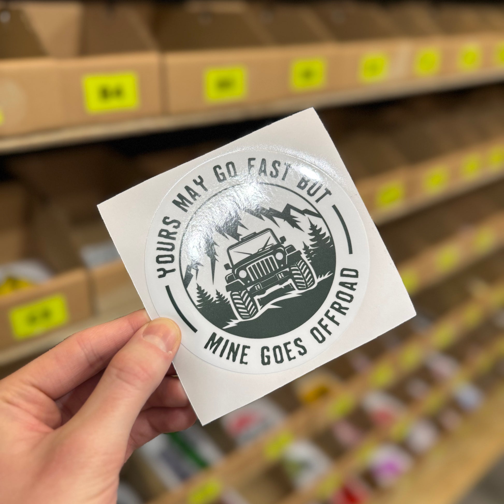 Off-road 4x4 illustration reading “Yours may go fast but mine goes offroad” funny vinyl sticker.