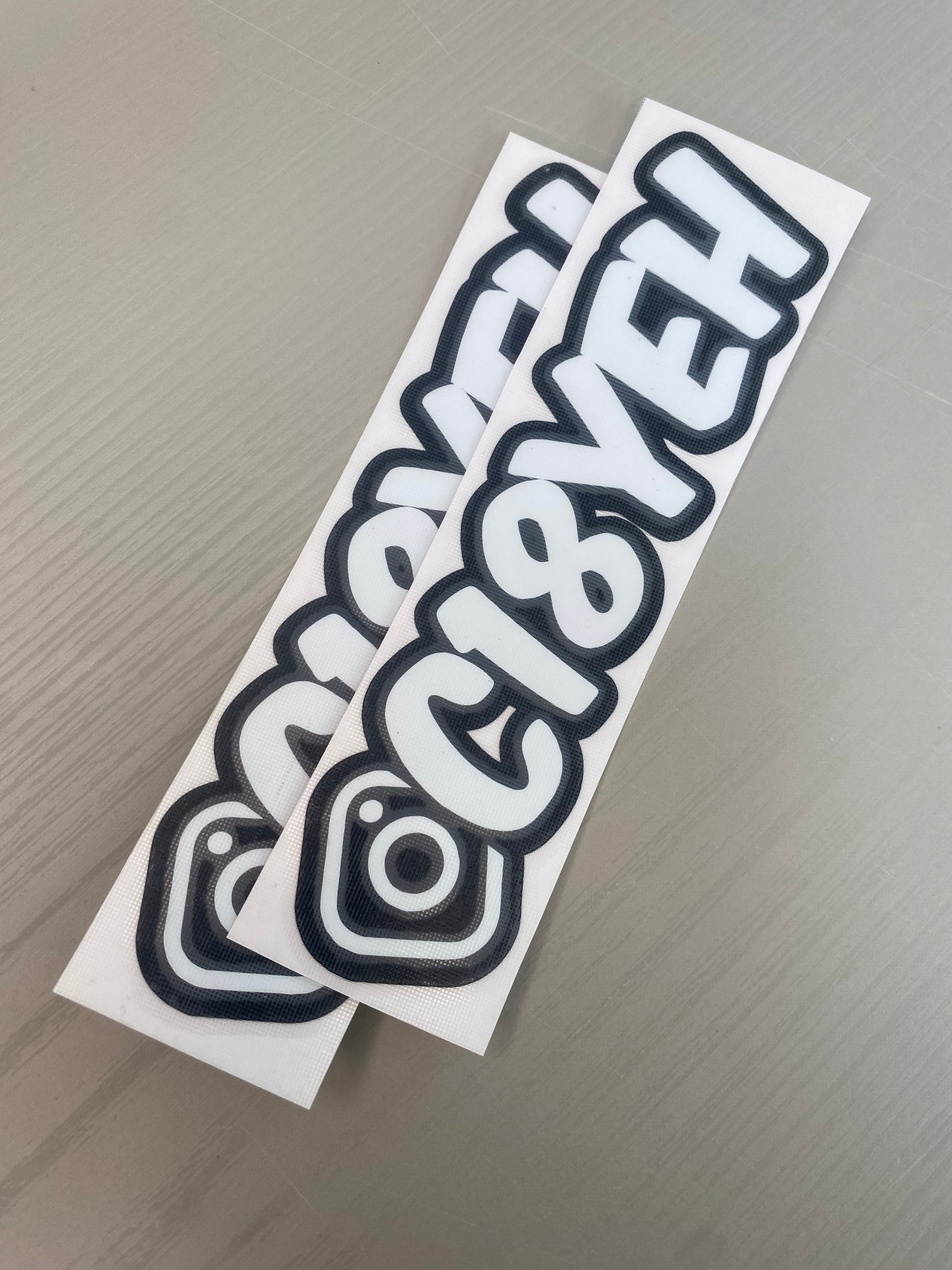 Gloss White Vinyl Instagram Tag Sticker with gloss black outline